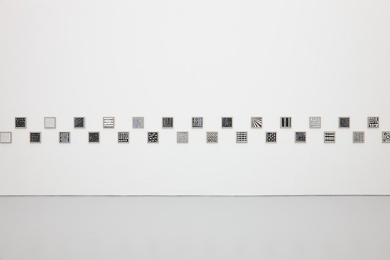 Lubaina Himid, installation shot of Cotton.com (2002). Eighty-five oil on canvas panels, brass strip. Courtesy Stuart Whipps (photographer) and Spike Island.