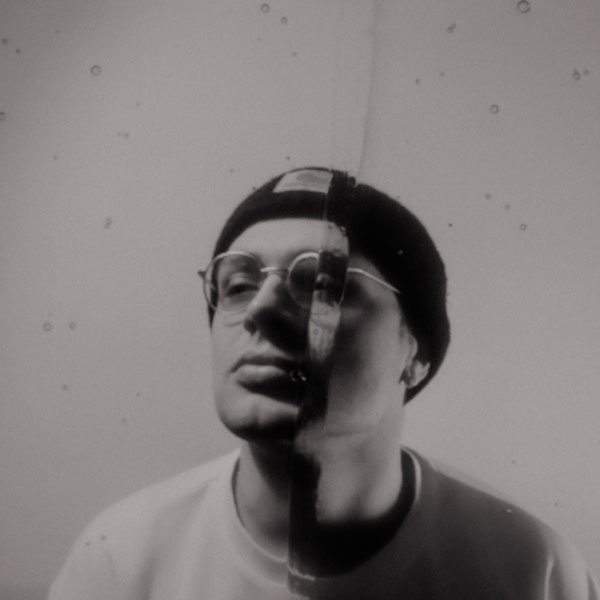 A monochrome analogue distressed photo featuring corto.alto composer Liam Shortall